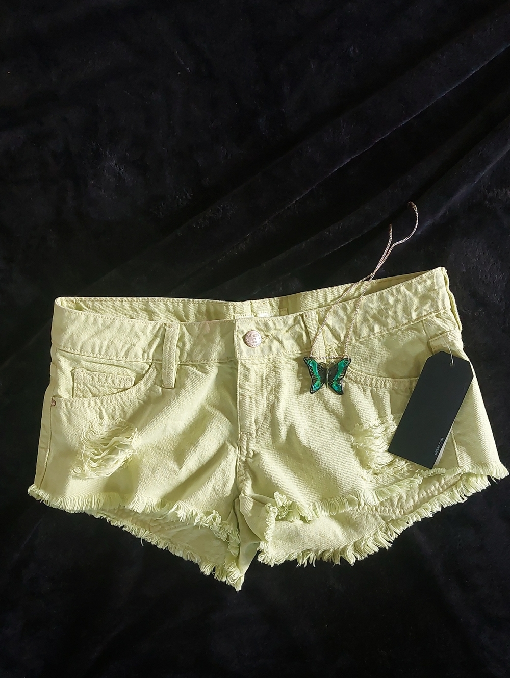 Guess Distressed Shorts with Butterfly Charm Necklace